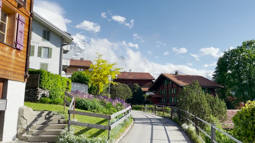 Timeless beauty of Wengen, Switzerland alpine village with panoramic mountains, Wengen offers a picturesque escape for every season. 