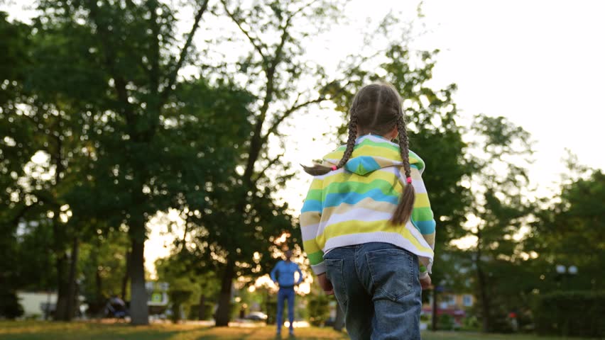 happy family, father spinning child his arms, playing superhero, children running park sunset, active daughter, spinning, distance, spring sunshine, people park, happiness, morning sunrise, running