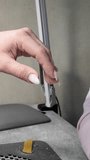 Hand sanitizer treatment in a cosmetology salon. Preparation of the nail plate before applying gel polish. Vertical close-up video of hands.