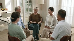 senior asian people in support group discussing and sharing experience - Powered by Shutterstock - Get 15% off with code: PIKWIZARD15