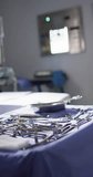 Vertical video of close up of surgery equipment. Global medicine, health, lifestyle and hospital concept.