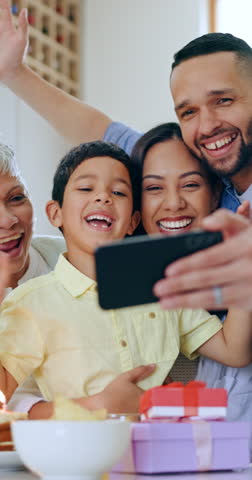 Happy family, selfie and photography for birthday, memory or bonding celebration together at home. Parents, grandparents and kid smile, wave and cake for photograph, picture or video call at house Royalty-Free Stock Footage #3456982901