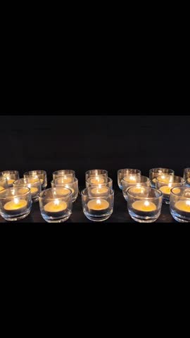 Burning offering candles at a Tibetan monastery