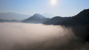 Drone Video of Majestic Mountain Landscape Above The Clouds. 4k Cinematic Footage.
