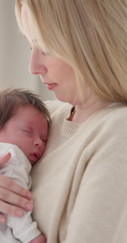 Mother, baby care and nap with love and support for newborn in nursery with sleep. Young child, mom and family with youth and childcare with bonding and maternity in a home with infant and rocking