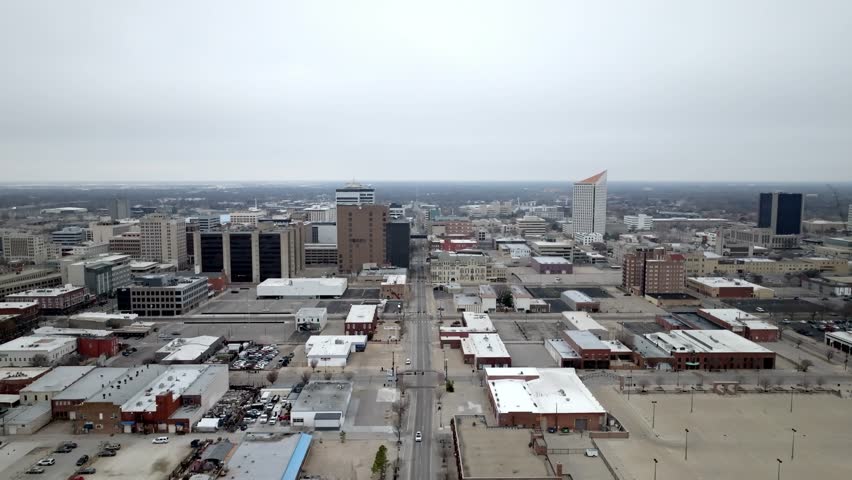 Downtown Wichita, Kansas with drone video moving sideways.