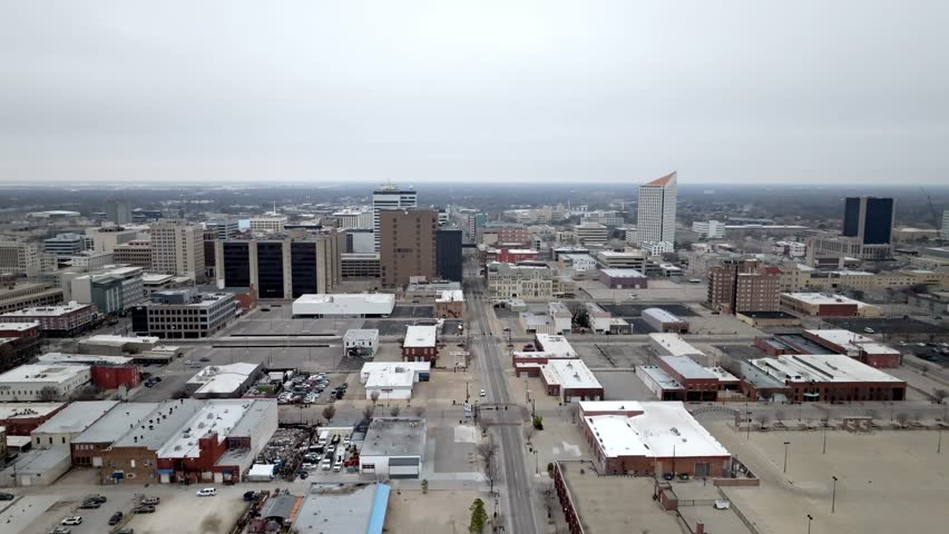 Downtown Wichita, Kansas with drone video moving in.