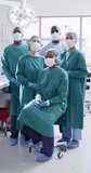 Vertical video of portrait of diverse surgeons with face masks. Global medicine, health, lifestyle and hospital concept.