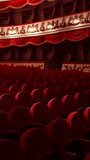Empty classic theater. Rows of empty red velvet seats inside a theater or opera. No people in hall because of pandemic. Selective focus on opera interior. Vertical video. - Powered by Shutterstock - Get 15% off with code: PIKWIZARD15