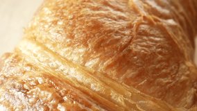 Croissant: Made from laminated dough, layered with butter through 