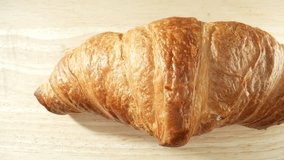 Classic French pastry, croissant: Flaky, buttery layers, crescent shape. Originated in Vienna, Austria; popularized in France. Made from leavened dough. Food concept. Fast-food background. 4K HDR.
 - Powered by Shutterstock - Get 15% off with code: PIKWIZARD15