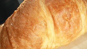 Croissant: Popular French pastry, flaky, buttery, crescent-shaped. Layered dough rolled or folded for delicate, airy interior and crisp, golden-brown layers outside. Fast-food background. 4K HDR. 
 - Powered by Shutterstock - Get 15% off with code: PIKWIZARD15