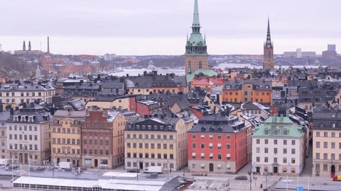 Telephoto aerial view of iconic medieval architecture of Gamla Stan, Stockholm: stockvideo