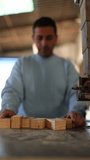 Man working wood in his carpentry shop.
4k video showing some details of work, copy space for publications