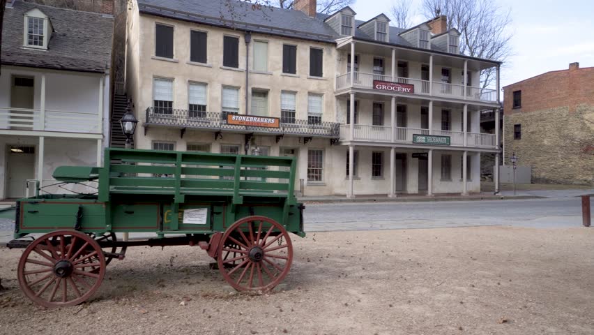 Steadicam gimbal motion of horse drawn wagon and the empty streets of Harpers Ferry National Park.