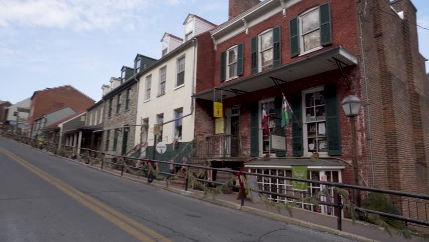 Street scene motion of old historic buildings at Harpers Ferry National Park in West Virginia.