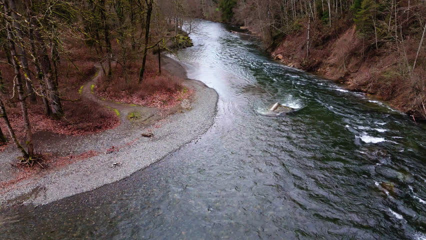 Pacific Northwest Smooth forward movement of fast flowing Cedar River in Washington State