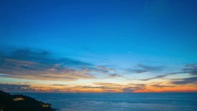 
aerial hyper lapse view exotic sweet sky in sunset at Karon beach Phuket.
Scene of colorful romantic sky sunset with changing the brilliant yellow sky gradually turned red. 
4k video travel concept.