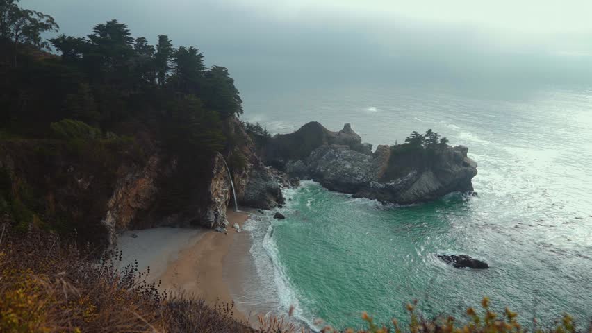 McWay Falls at Big Sur, Pfeiffer Beach, California. Beach waterfall pacific coast