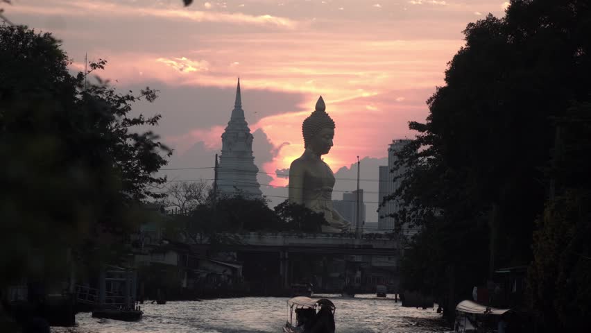 Bangkok, Thailand . February 18, 2024. Evening sunset at The Giant Buddha Statue at the Wat Paknam Phasi Charoen temple