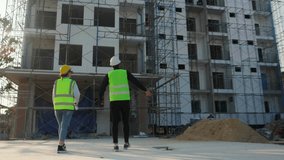 Team architect or engineer inspection and planning construction at construction site, team contractor or builder walking examining and checking project development house, industry concept. - Powered by Shutterstock - Get 15% off with code: PIKWIZARD15