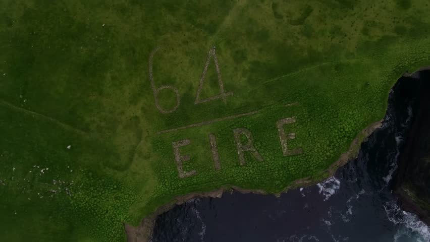 64 Eire warning sign constructed out of rocks on the cliff of County Mayo in Ireland in World War Two to be visible from the sky Royalty-Free Stock Footage #3457418901
