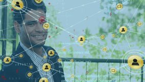 Animation of network of connections with icons over biracial businessman using smartphone. Global finance, business, connections, computing and data processing concept digitally generated video. - Powered by Shutterstock - Get 15% off with code: PIKWIZARD15