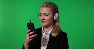 Happy Business Woman Laughing Watch Movie Mobile Phone Headphones Green Screen