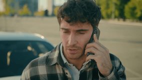 Close up worried frustrated stressed Caucasian man car driver talking mobile phone displeased businessman male guy speak smartphone sad anxious emotions problem talk cellphone on city street outdoors - Powered by Shutterstock - Get 15% off with code: PIKWIZARD15