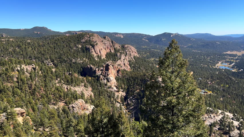 Staunton State Park Colorado summer hike bike horse ride trail Rocky Mountains Pikes peak Bugling Elk Falls trail Bailey Conifer Evergreen sunny blue sky scenic landscape slow pan left