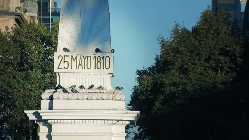 Street Pigeons Resting on the Piramide de Mayo in Downtown Buenos Aires