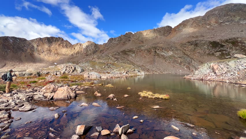 Kite Lake reflection hike trail Mount Lincoln loop Kite Lake Trail hiking 14er Rocky Mountain Colorado Bross Cameron Democrat Grays Torreys Quandary mountaineering peaks morning landscape pan left
