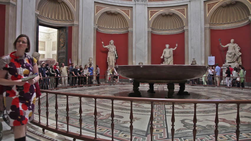 VATICAN CITY - MAY 5, 2012: Tourists walking around the Round Room housing