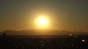 TOKYO, JAPAN : Sunset time lapse shot of cityscape of Tokyo and Mount Fuji. View of buildings and street at downtown area. Japanese nature, metropolis and urban city life concept 4K video.