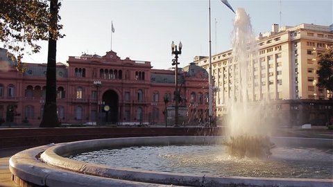 Plaza de Mayo square with Casa Rosada Presidential Palace, argentine Flag and Fountain, in Buenos Aires, Argentina. 