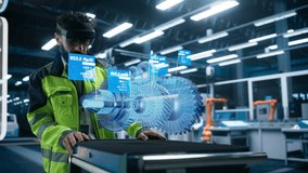Automotive Factory Engineer Using Augmented Reality Headset in a Modern Facility with Automated Robotic Arms on an Assembly Plant. Specialist Ananlyzing and Manipulating a Virtual Gearbox Model - Powered by Shutterstock - Get 15% off with code: PIKWIZARD15
