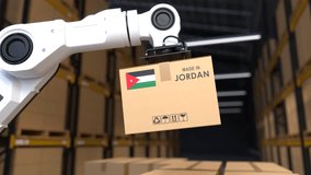 The robot arm is lifting a box of products made in Jordan, The Warehouse automation concept - Powered by Shutterstock - Get 15% off with code: PIKWIZARD15
