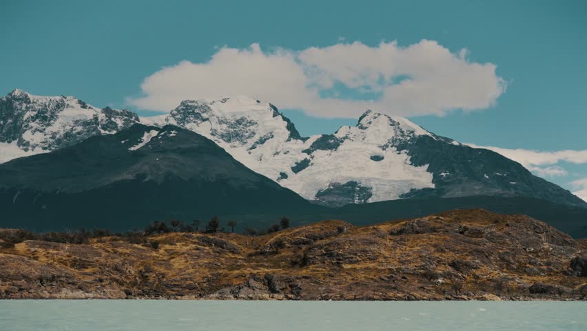 Snowcapped Mountains At Lago Argentino Freshwater Lake In Argentina. Wide Shot Royalty-Free Stock Footage #3458068451