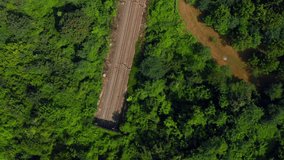 Railway through rural landscape. Aerial top down view