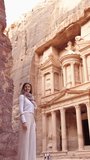 Video of blonde woman in spectacular view of Al Khazneh, city of Petra, Jordan