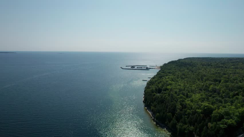 Drone shot of the heavily wooded northern Wisconsin shoreline