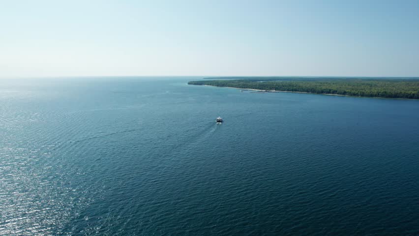 Drone shot of a large boat in Lake Michigan off the shores of Wisconsin