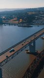 Flying over the bridges leading to Martinez, California, USA. Beautiful American city scenery at sunny daytime. Aerial view. Vertical video.