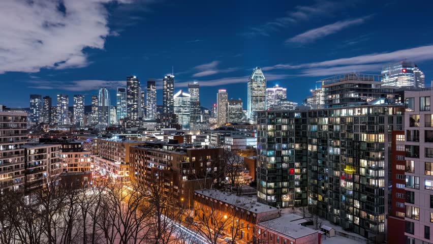 Night time lapse wide angle view of downtown Montreal from Griffintown in winter night Royalty-Free Stock Footage #3458402795