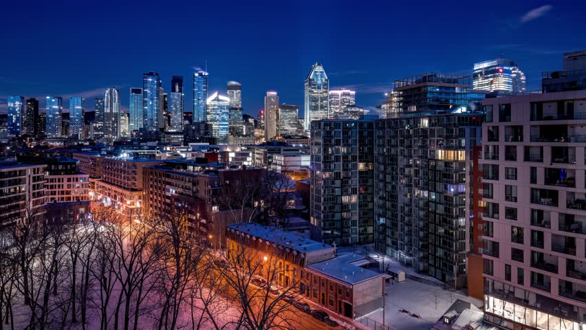 Night to day time lapse wide angle view of downtown Montreal from Griffintown in winter morning Royalty-Free Stock Footage #3458408643