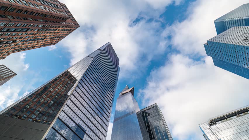 Look up daylight time lapse view of clouds moving over Hudson Yards in Midtown Manhattan Royalty-Free Stock Footage #3458445309