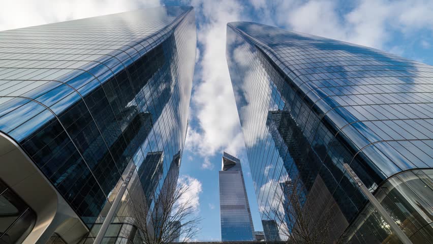 Look up daylight time lapse view of clouds moving over West Manhattan and the Edge in Midtown Manhattan Royalty-Free Stock Footage #3458447017