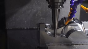 The CNC milling machine cutting   mold part by solid ball end mill tool. The mold parts cutting process by machining center with solid ball end mill. - Powered by Shutterstock - Get 15% off with code: PIKWIZARD15