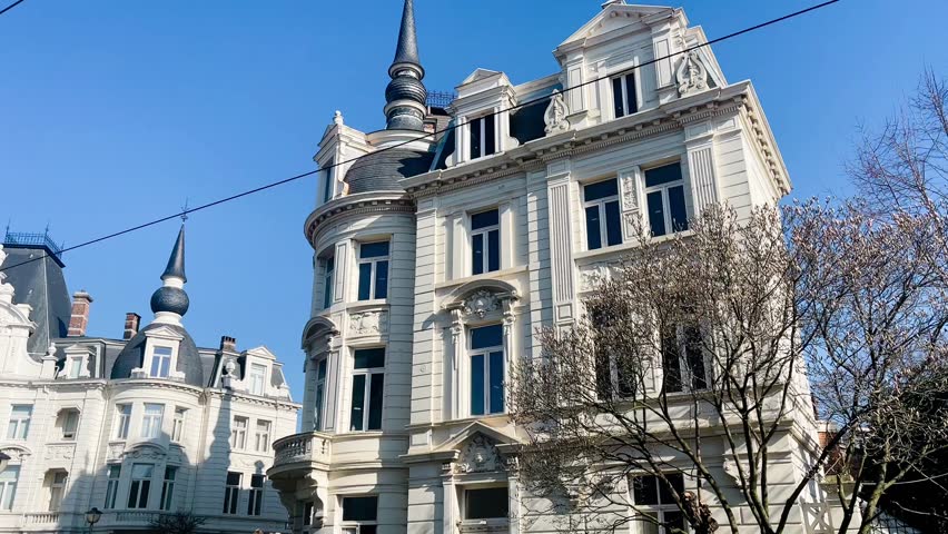 Grand architecture in historical part of the city of Antwerp, Belgium on a sunny day, slow motion video