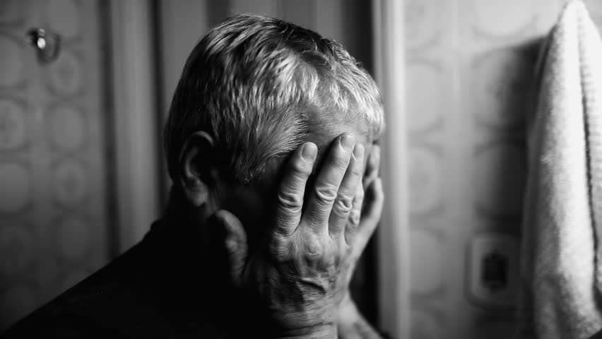 Depressed aged senior man regretting past mistakes covering face in shame feeling despair. Stressed older 70s person in deep regret in monochrome, black and white Royalty-Free Stock Footage #3458766011